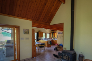 Lounge, stove and kitchen